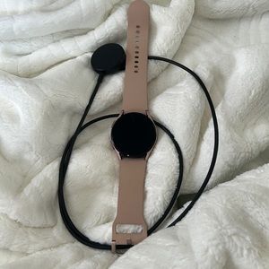 Rose gold Samsung watch.